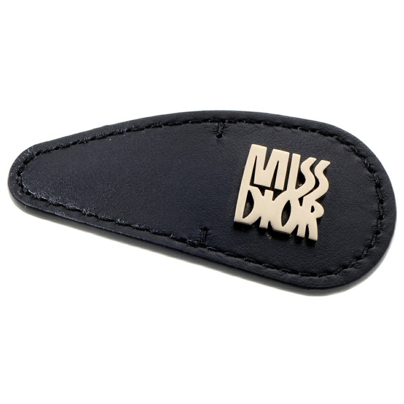 Metal Hair Clip by Christian Dior Leather: Metal Hair Clip by Christian Dior Leather Christian Dior Leather Metal Hair Clip, a sleek and sophisticated accessory featuring black leather and metal details. This compact hair clip measures 6cm x