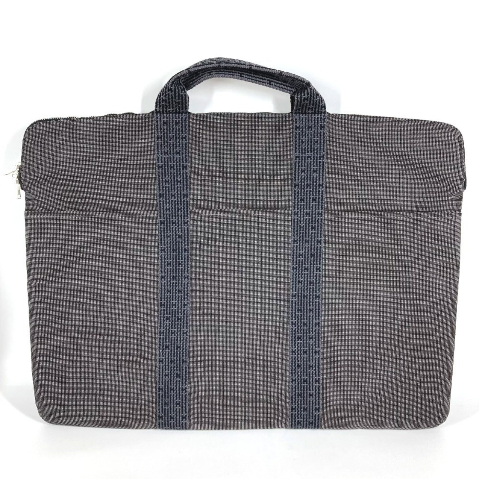 Hermes briefcase canvas: Hermes briefcase canvas Gray canvas briefcase from Hermes' Her Line, measuring 39cm x 54cm with a sturdy design. Brought to you by the renowned French fashion house, this versatile and stylish