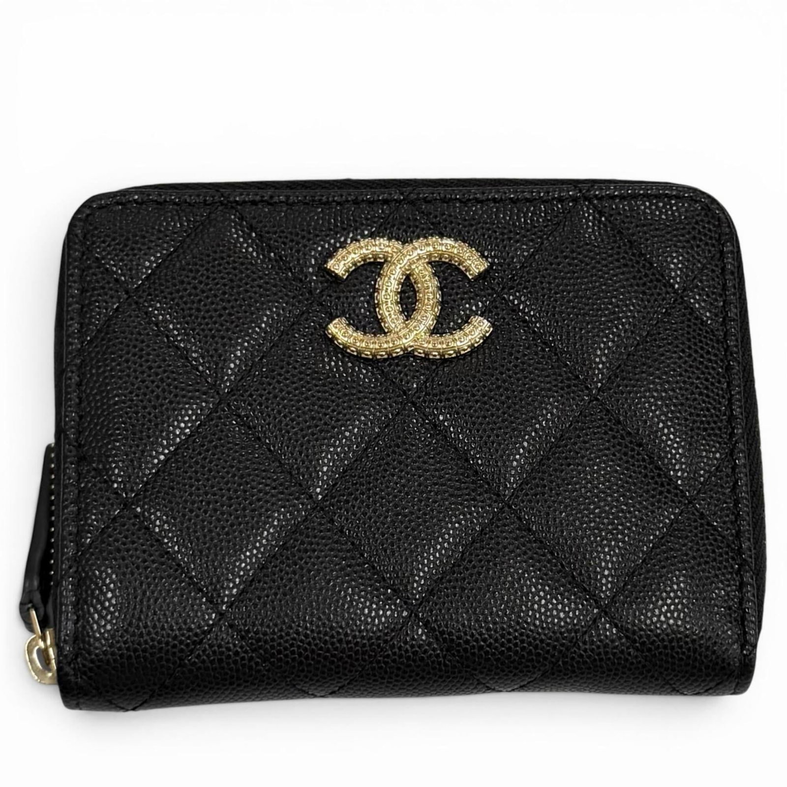Calfskin Wallet Bi Fold Grained Chanel: Calfskin Wallet Bi Fold Grained Chanel Calfskin wallet with bi-fold design, made from high-quality grained Calfskin material, and bearing a signature. This black Chanel wallet measures 9cm x 12cm /