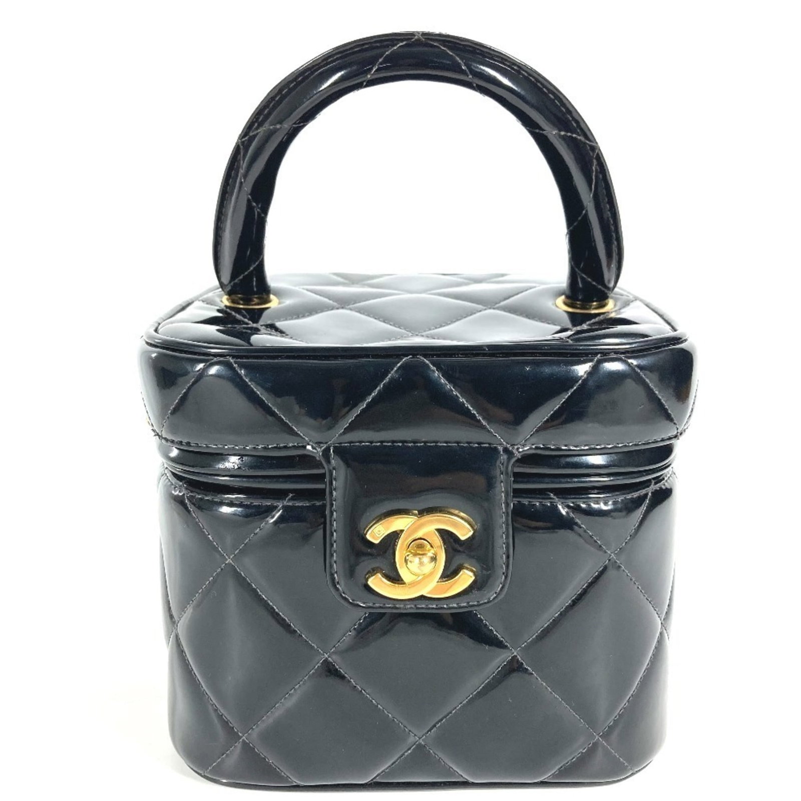Chanel Handbag Vanity Bag Patent Leather: Chanel Handbag Vanity Bag Patent Leather Black patent leather Chanel Matelasse Handbag Vanity Bag with precise measurements and classic design. This vintage bag boasts its striking black finish, chara