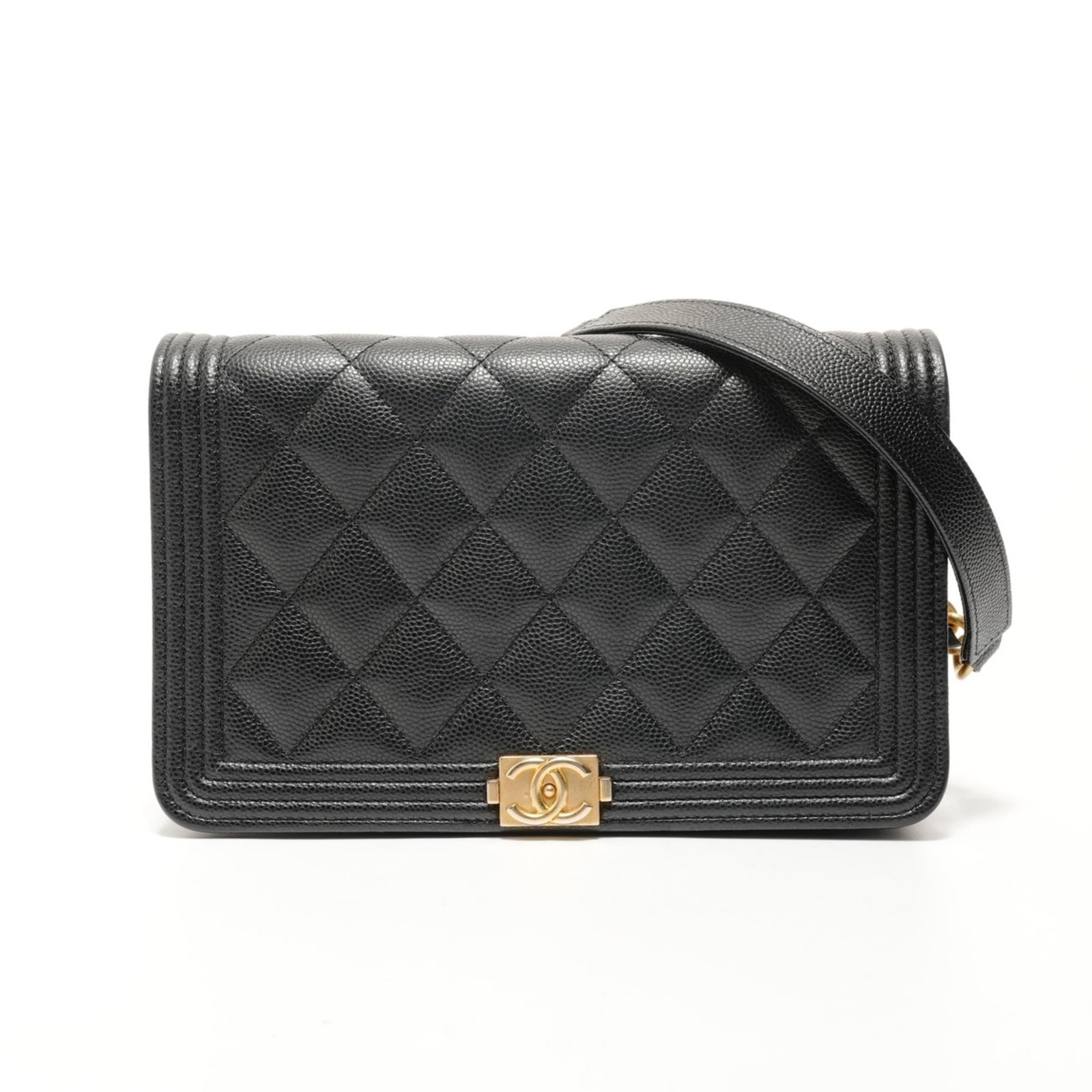 Shoulder Bag by Chanel: Shoulder Bag by Chanel Black Boy Chanel shoulder bag with classic design, measuring 12cm x 19cm x 4cm. Features a sleek strap length of 128cm, perfect for everyday use. A timeless piece from the iconi