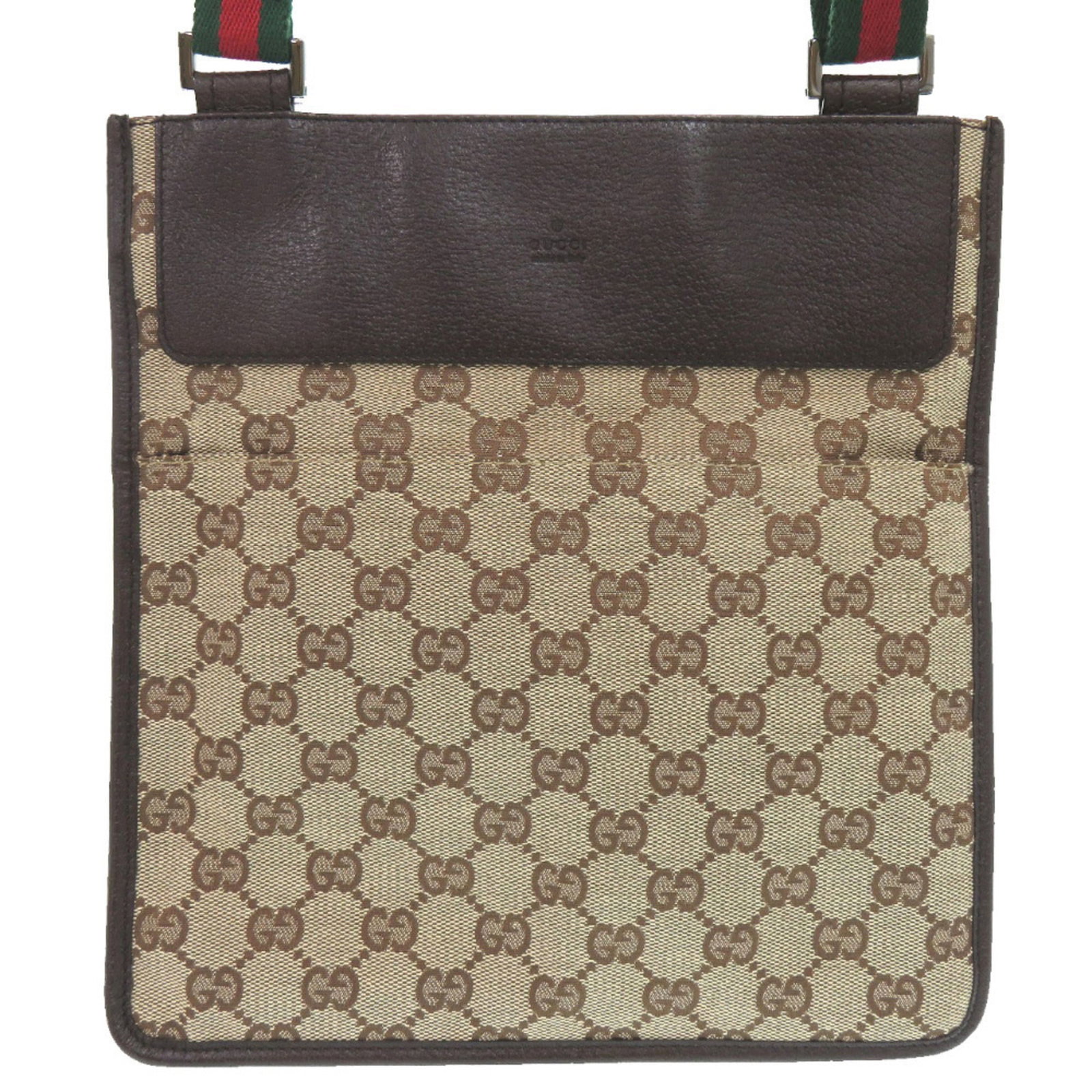 Canvas Leather Gucci Sling Bag Messenger: Canvas Leather Gucci Sling Bag Messenger GG canvas and leather come together in this Gucci messenger bag, offering a unique blend of style and functionality. The classic design features a signature br