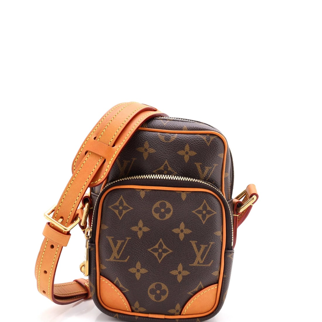 Louis Vuitton Amazone Bag Monogram Archive: Louis Vuitton Amazone Bag Monogram Archive The Louis Vuitton Amazone Bag Monogram Archive boasts a timeless design with its iconic monogram pattern and brown canvas exterior. Measuring 7.5" tall, 5"