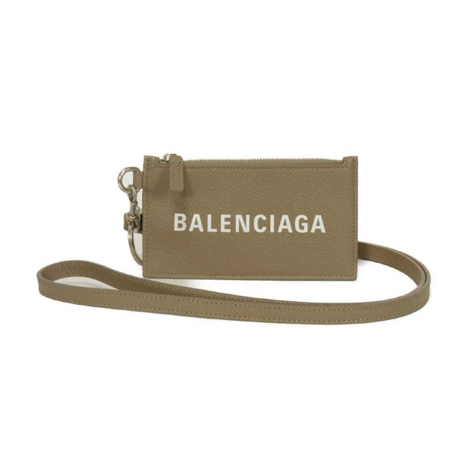 Case leather card from Balenciaga: Case leather card from Balenciaga The Balenciaga case leather card boasts sleek, modern design with a sophisticated grayish hue. Crafted from high-quality leather, its compact size makes it an ideal