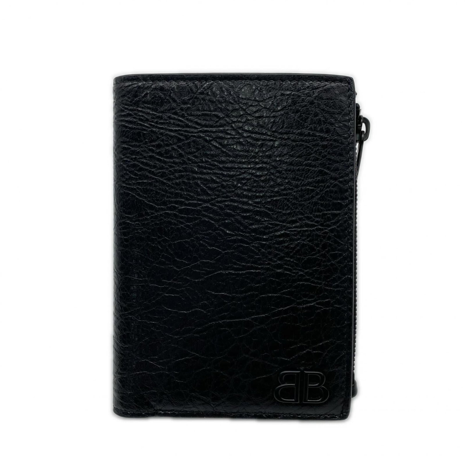 Balenciaga Wallet (Bi-Fold) Leather: Balenciaga Wallet (Bi-Fold) Leather The Balenciaga bi-fold wallet features high-quality lambskin leather in black, with clean lines and minimal design. Measuring 8.5cm x 12.5cm, it provides a compact