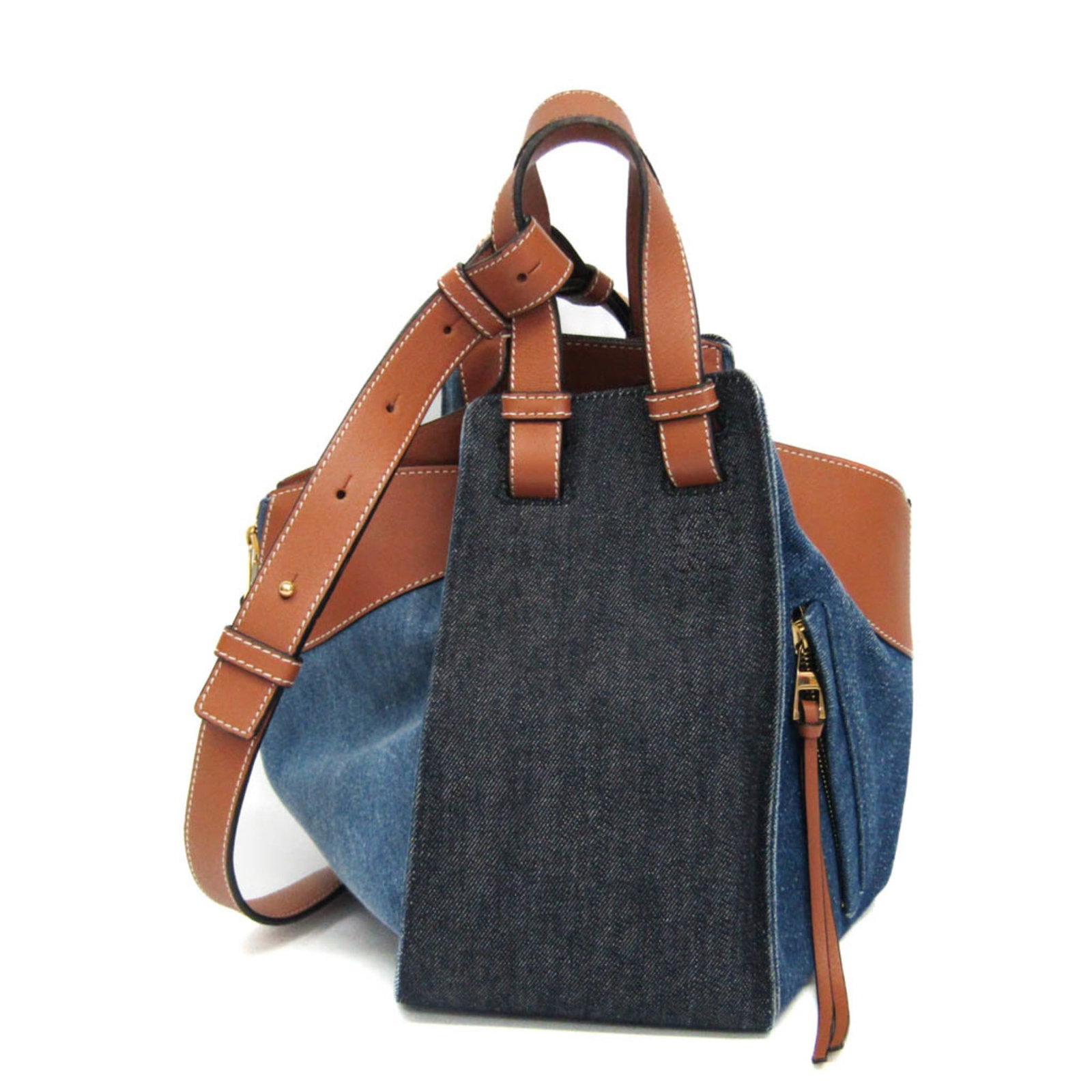 Leather shoulder bag denim loewe handbag: Leather shoulder bag denim loewe handbag Leather shoulder bag with denim accents from Loewe, featuring a blue and brown color scheme and open pocket for storing essentials. The bag boasts a unique com