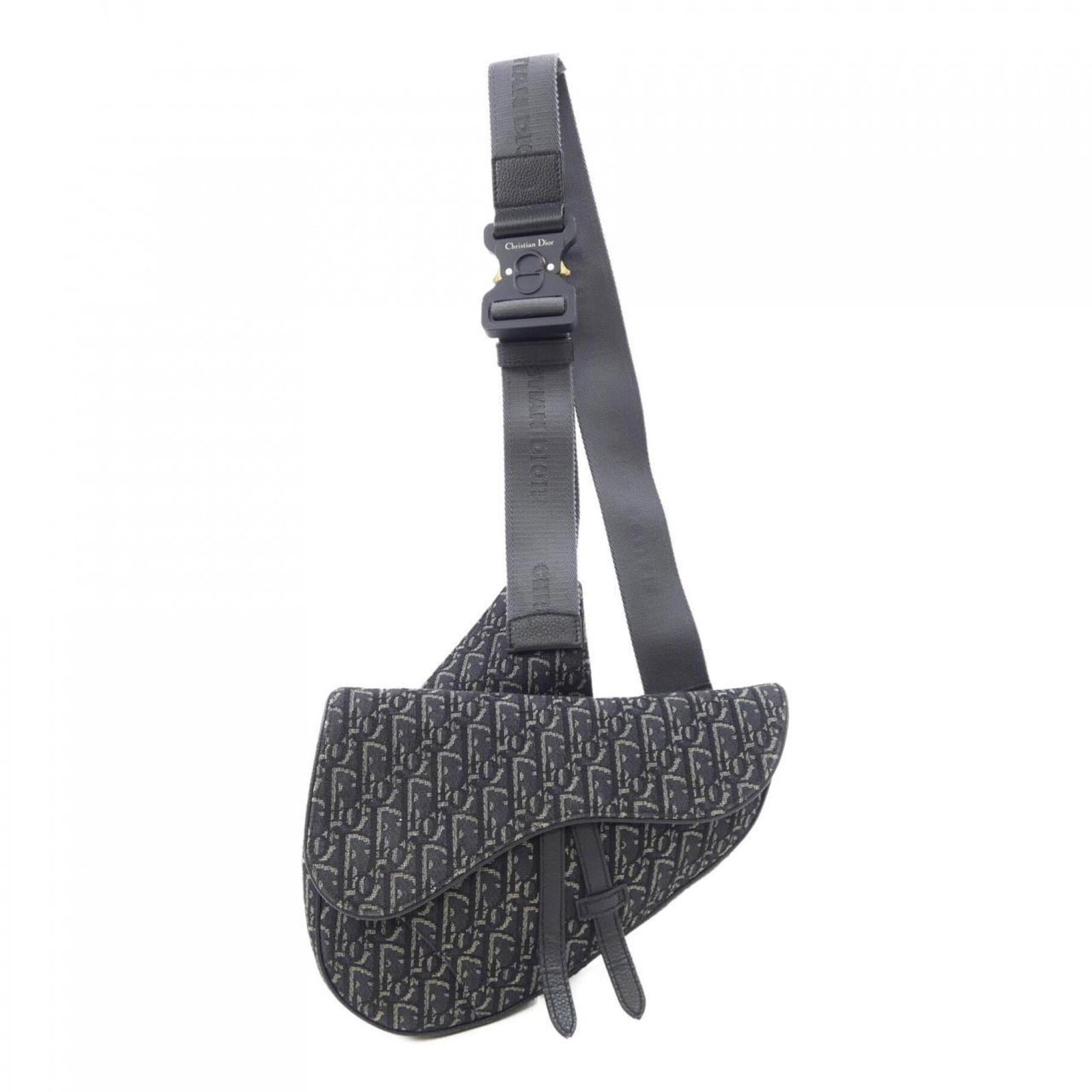 Handbag by Christian Dior: Handbag by Christian Dior Christian Dior's sleek black handbag boasts a sophisticated design with clean lines and a compact size, making it perfect for everyday use. Measuring 20cm x 27cm x 4.5cm,