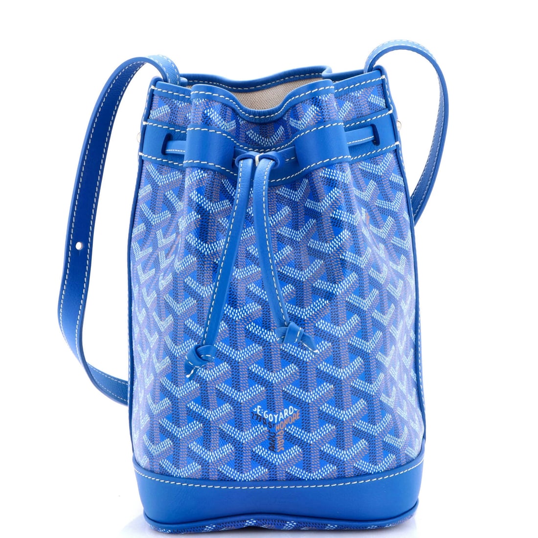 Goyard Petit Flot Bucket Bag Coated Canvas PM: Goyard Petit Flot Bucket Bag Coated Canvas PM The Goyard Petit Flot Bucket Bag Coated Canvas PM boasts a striking blue exterior and neutral interior, making it a versatile accessory for everyday use.