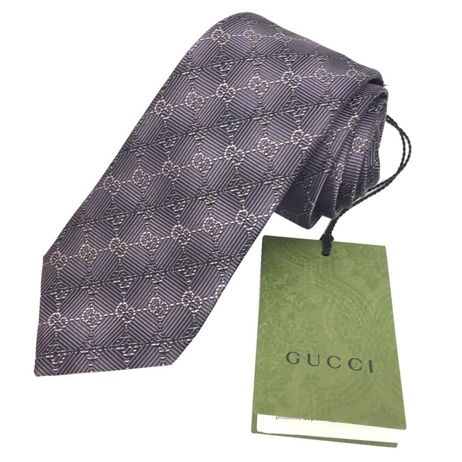 Cravat Silk Gucci: Cravat Silk Gucci Silk cravat from Gucci, available in purple and presented in its original box. This accessory features a width of 7cm / 2.75'' and is made from high-quality silk material. The item b