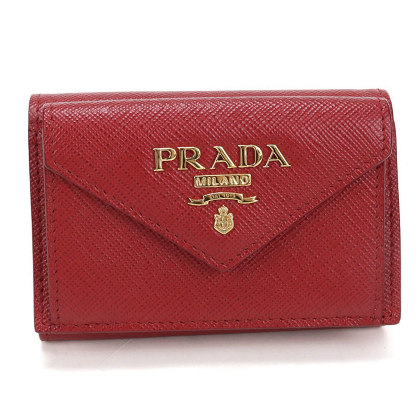Prada Wallet (Tri-Fold) Leather: Prada Wallet (Tri-Fold) Leather Tri-fold Prada leather wallet in red color, crafted from high-quality calfskin. Made with attention to detail and classic design, this wallet measures 7cm x 10cm x 3cm.