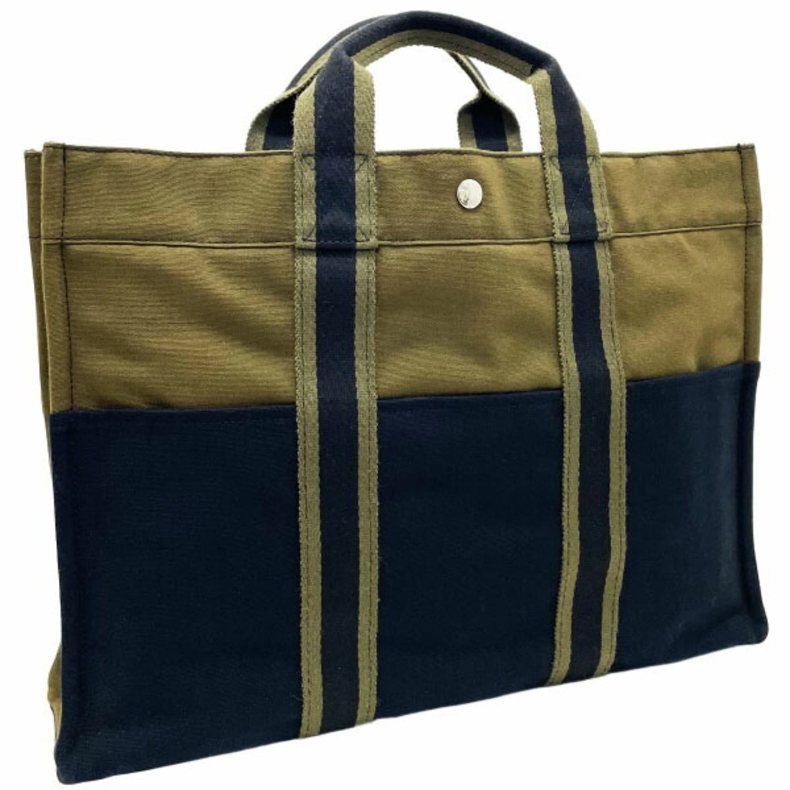 Handbag Tote Bag of Canvas by Hermes: Handbag Tote Bag of Canvas by Hermes Canvas by Hermes Handbag Tote Bag - A Timeless Design. Made from high-quality canvas, this tote bag boasts a classic design with clean lines and a spacious interio