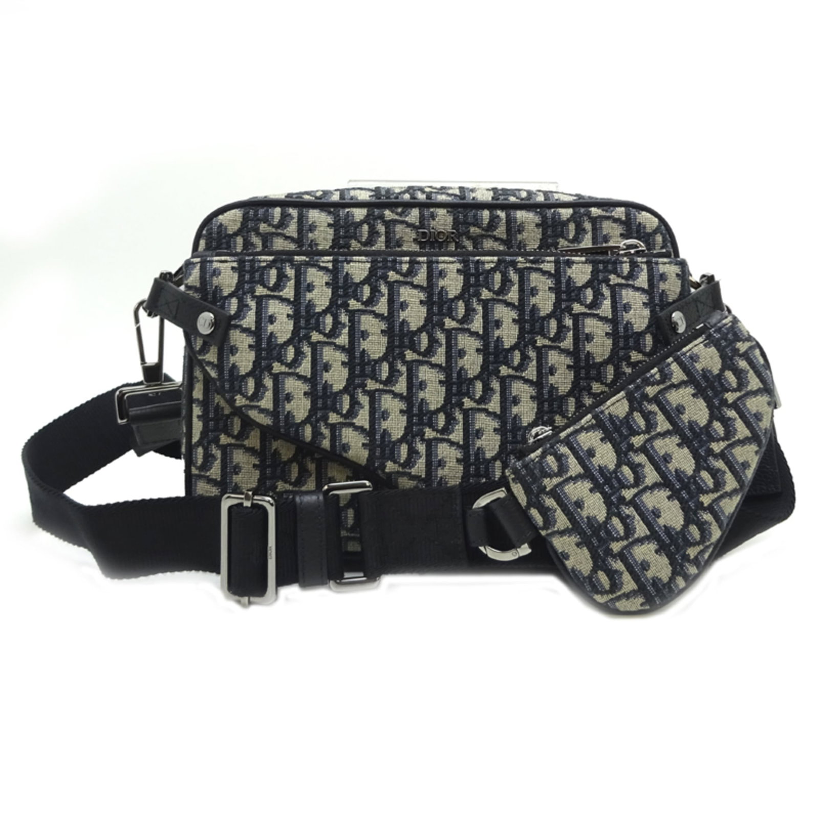 Dior Pouch Bag Jacquard Shoulder: Dior Pouch Bag Jacquard Shoulder The Dior Pouch Bag Jacquard Shoulder boasts a sleek, navy hue and intricate jacquard design. Made from high-quality materials, its compact size makes it perfect for