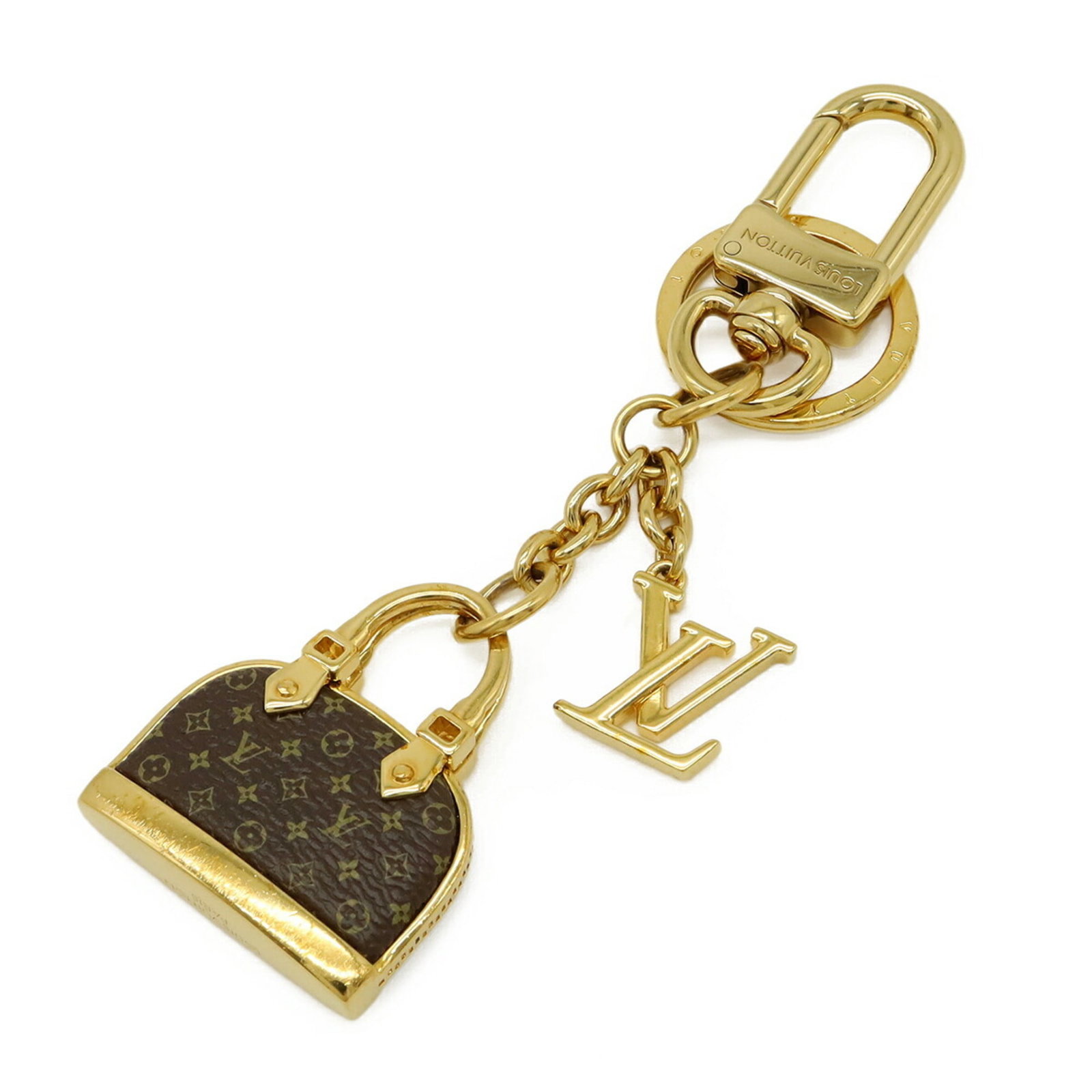 Louis Vuitton Handbag Monogram: Louis Vuitton Handbag Monogram Gold brown Monogram Louis Vuitton Handbag with precise measurements, bearing the MPN M01799. This iconic handbag features a classic design and signature monogram