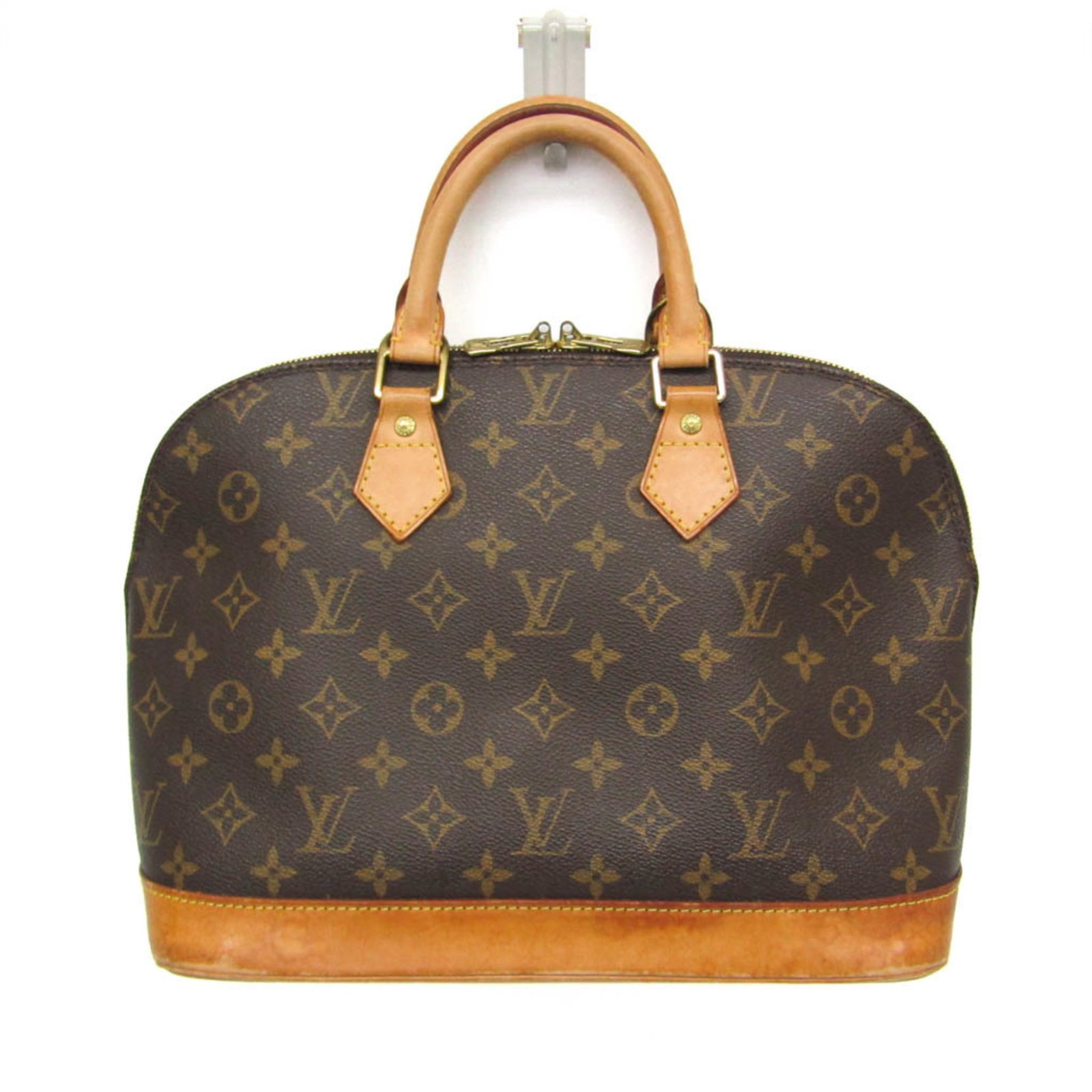 Louis Vuitton Handbag Monogram: Louis Vuitton Handbag Monogram The Louis Vuitton Alma Monogram handbag boasts its iconic monogram pattern, zip closure, and spacious open pocket. Measuring 24cm x 32cm x 17cm, it features a sturdy