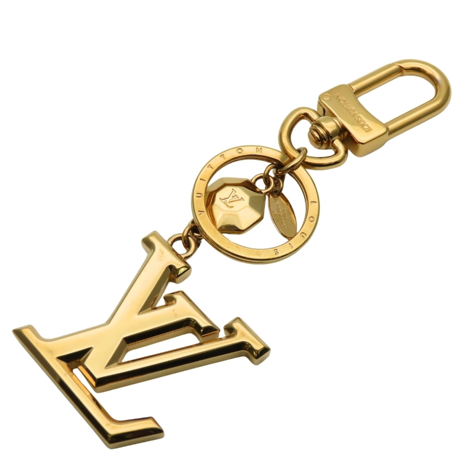 Metal gold plating keyring Louis Vuitton: Metal gold plating keyring Louis Vuitton Item Specifics: Brand: Louis Vuitton Country of Origin: Italy MPN: M65216 Type: Keyring Gender: Men,Women Color: Gold Material: Gold plating, Metal Product