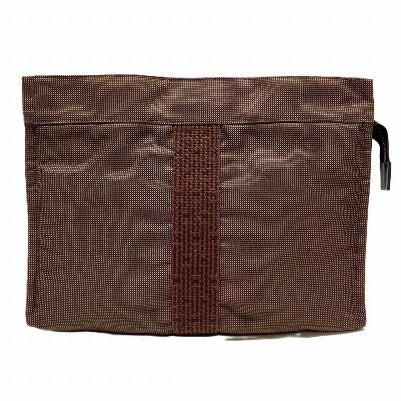 Canvas pouch bag clutch Hermes: Canvas pouch bag clutch Hermes Canvas pouch bag clutch from Hermes, crafted in brown canvas with clean lines and classic design. This compact clutch measures 30cm x 23cm x 10cm, making it a versatile 