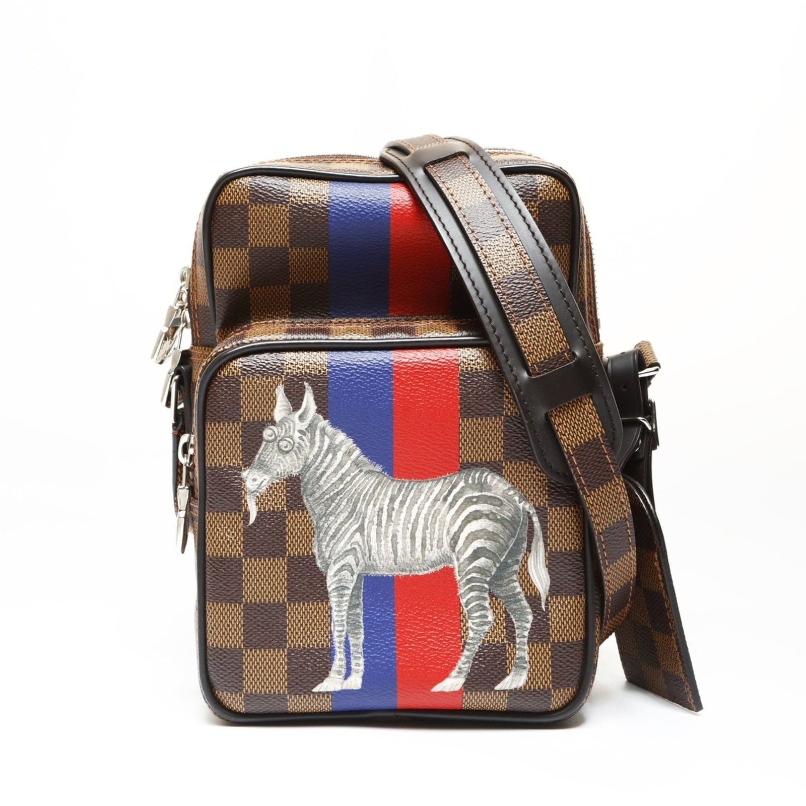 Shoulder bag from Louis Vuitton: Shoulder bag from Louis Vuitton Brown, Clear, and Damier Canvas Louis Vuitton Shoulder Bag. This shoulder bag from the iconic French fashion house features a classic design with clean lines and
