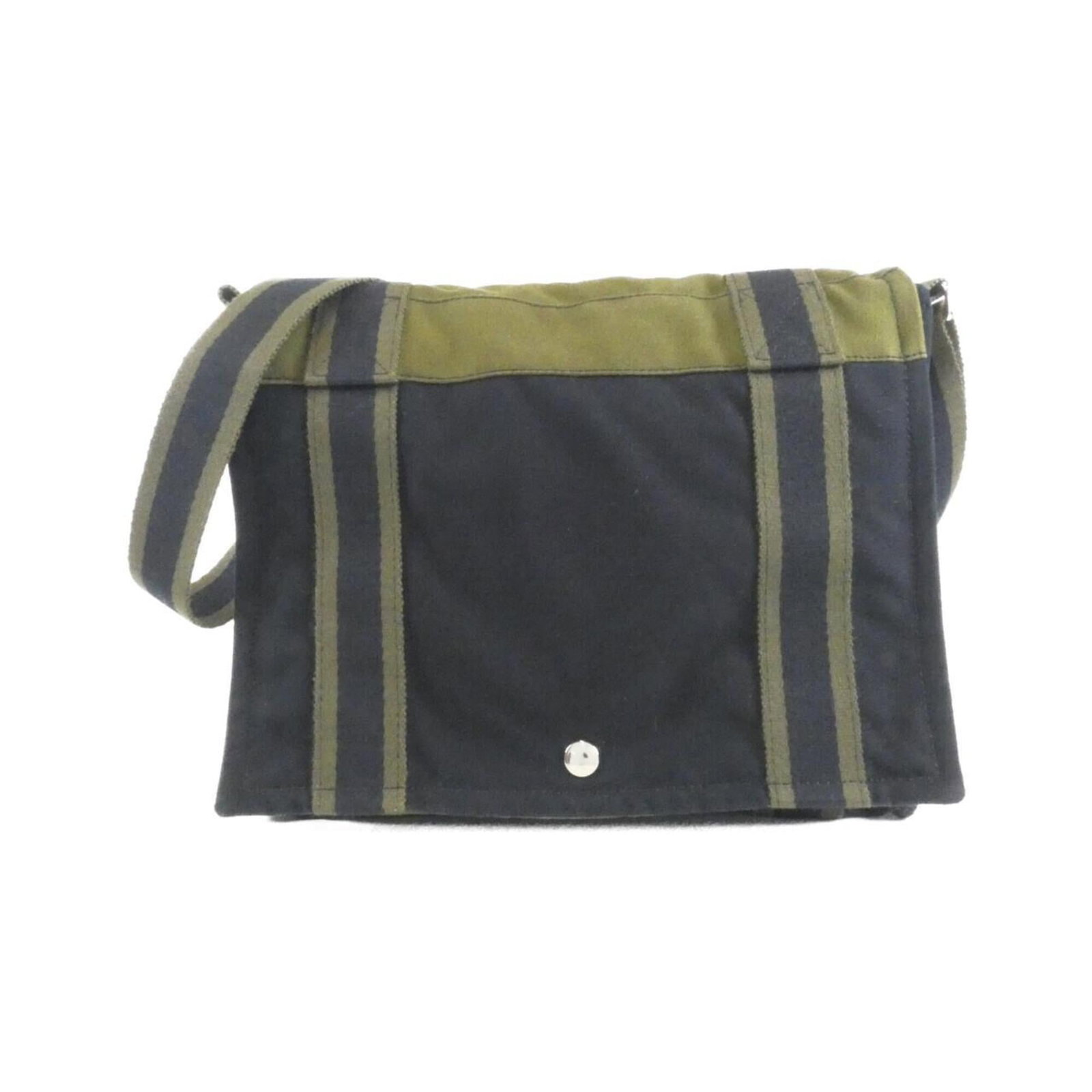 Shoulder Bag Canvas By Hermes: Shoulder Bag Canvas By Hermes Canvas By Hermes Shoulder Bag in Black and Khaki. This classic shoulder bag features a timeless design made from high-quality canvas, with silver hardware accents adding 