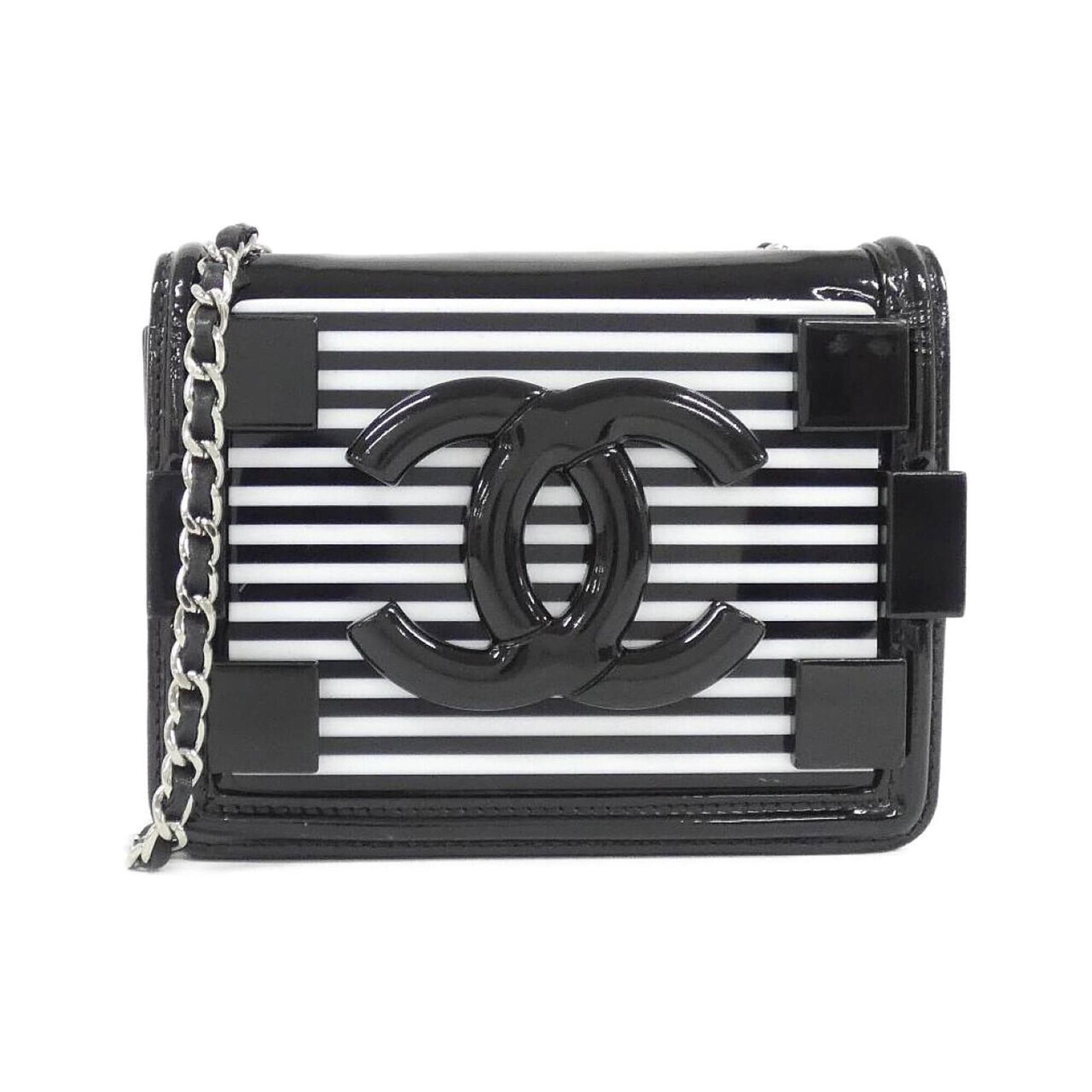 Shoulder Bag Leather Chanel: Shoulder Bag Leather Chanel Black and White Chanel Shoulder Bag with Silver Hardware, Made from Lamb Leather. This luxurious shoulder bag features sleek design and premium leather construction.