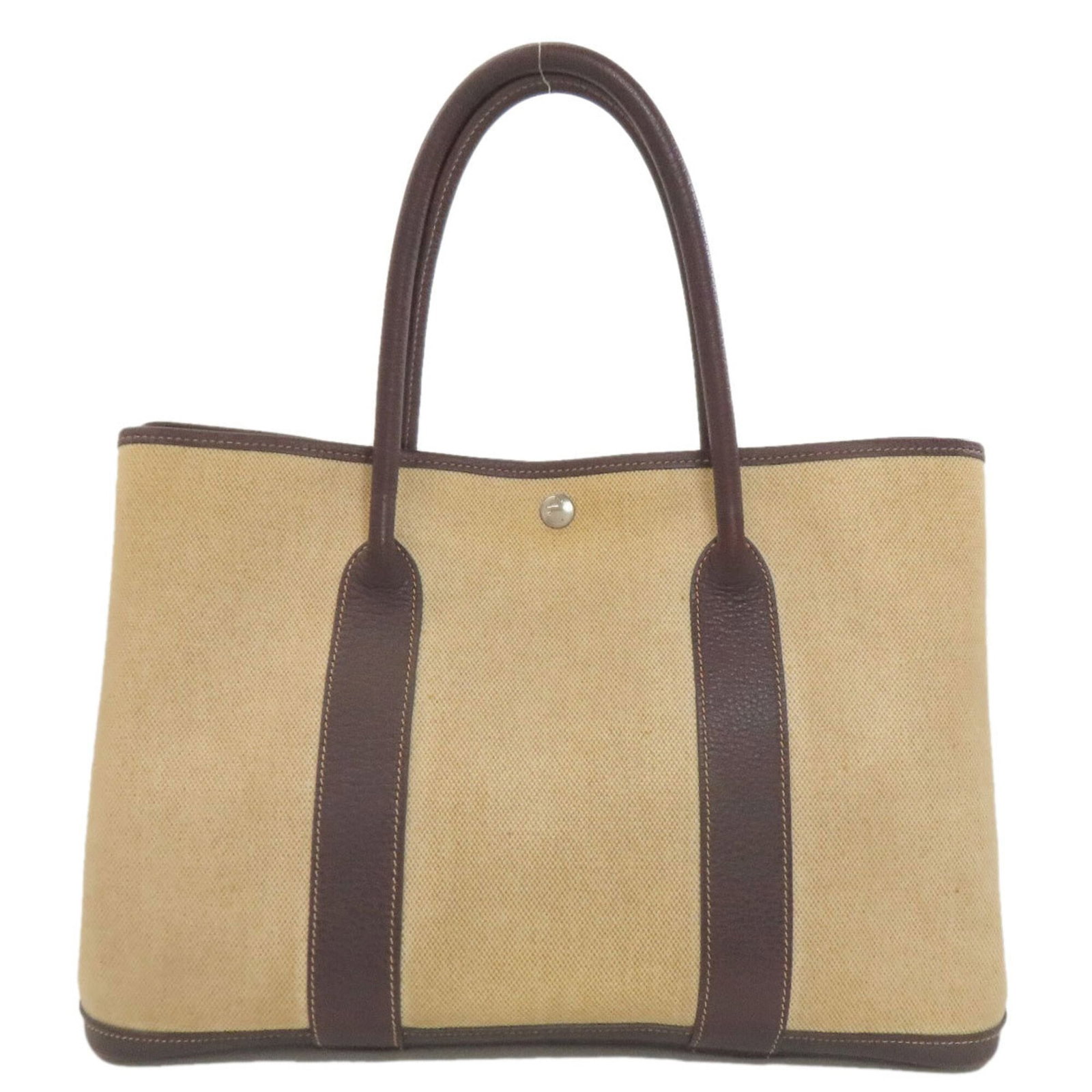 Hermes Tote Bag Toile H: Hermes Tote Bag Toile H The Hermes Toile H Tote Bag boasts its iconic design in beige, featuring the classic Herm?s pattern. Made from high-quality material, this bag measures 25cm x 36cm x 18cm and