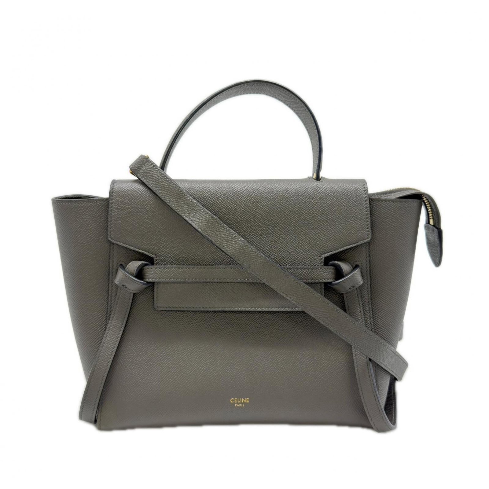 Handbag Celine Leather: Handbag Celine Leather Gray Celine Leather Handbag. Made from high-quality leather, this handbag measures 19.5cm x 23.5cm x 13cm and features a distinctive gray color. The bag's classic design makes