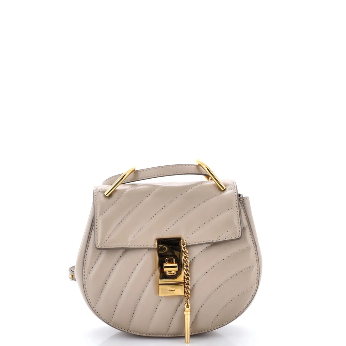 Quilted Leather Mini Bijou Crossbody Bag Chloe: Quilted Leather Mini Bijou Crossbody Bag Chloe Quilted Leather Mini Bijou Crossbody Bag by Chloe features neutral exterior and suede interior, with gold hardware. The bag boasts chain strap with