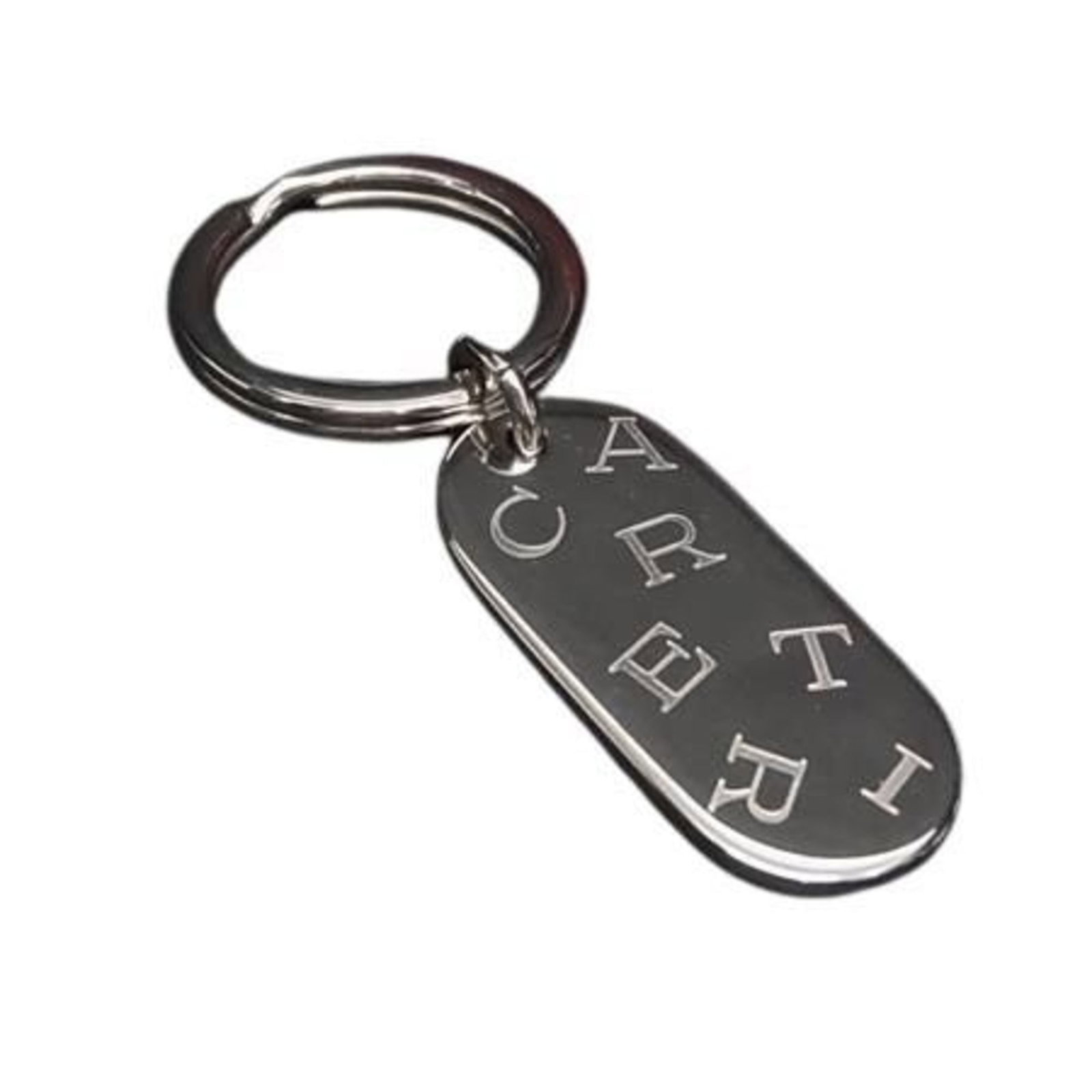 Keyring metal by Cartier: Keyring metal by Cartier Cartier's silver metal keyring bears the brand's signature craftsmanship, making it a sleek accessory for everyday use. The item comes in its original box, providing an added