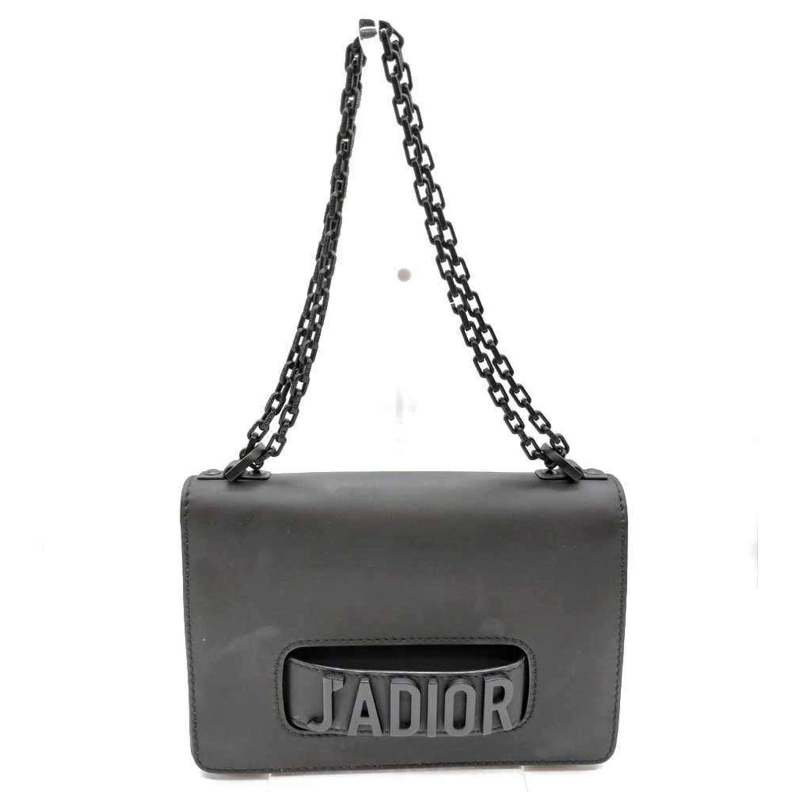 Shoulder bag leather by Christian Dior: Shoulder bag leather by Christian Dior Black leather shoulder bag by Christian Dior, featuring a classic flap closure and adjustable strap length ranging from 53cm to 94cm. This stylish bag measures