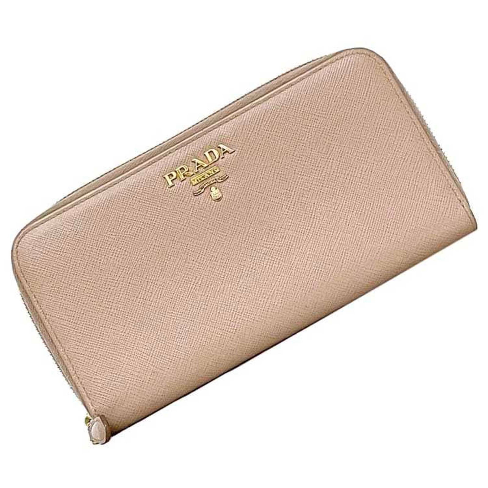 Prada Long Wallet (Bi-Fold) Leather: Prada Long Wallet (Bi-Fold) Leather Saffiano leather construction provides durability and sophistication to this elegant bi-fold wallet, featuring a classic beige color. Measuring 10.5cm x 20cm x