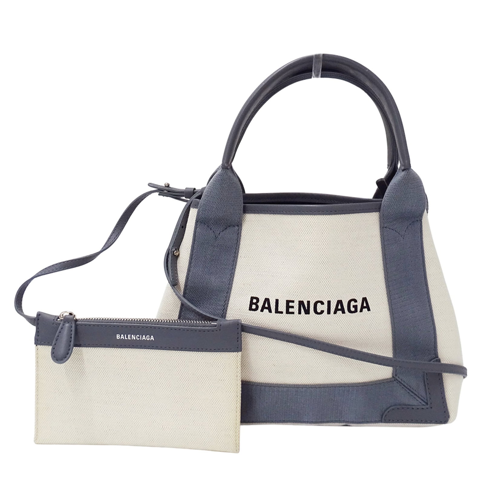 Canvas shoulder bag pouch handbag by Balenciaga: Canvas shoulder bag pouch handbag by Balenciaga Canvas shoulder bag pouch handbag by Balenciaga, featuring a timeless gray beige canvas material and sleek design. This stylish pouch measures 19.5cm x