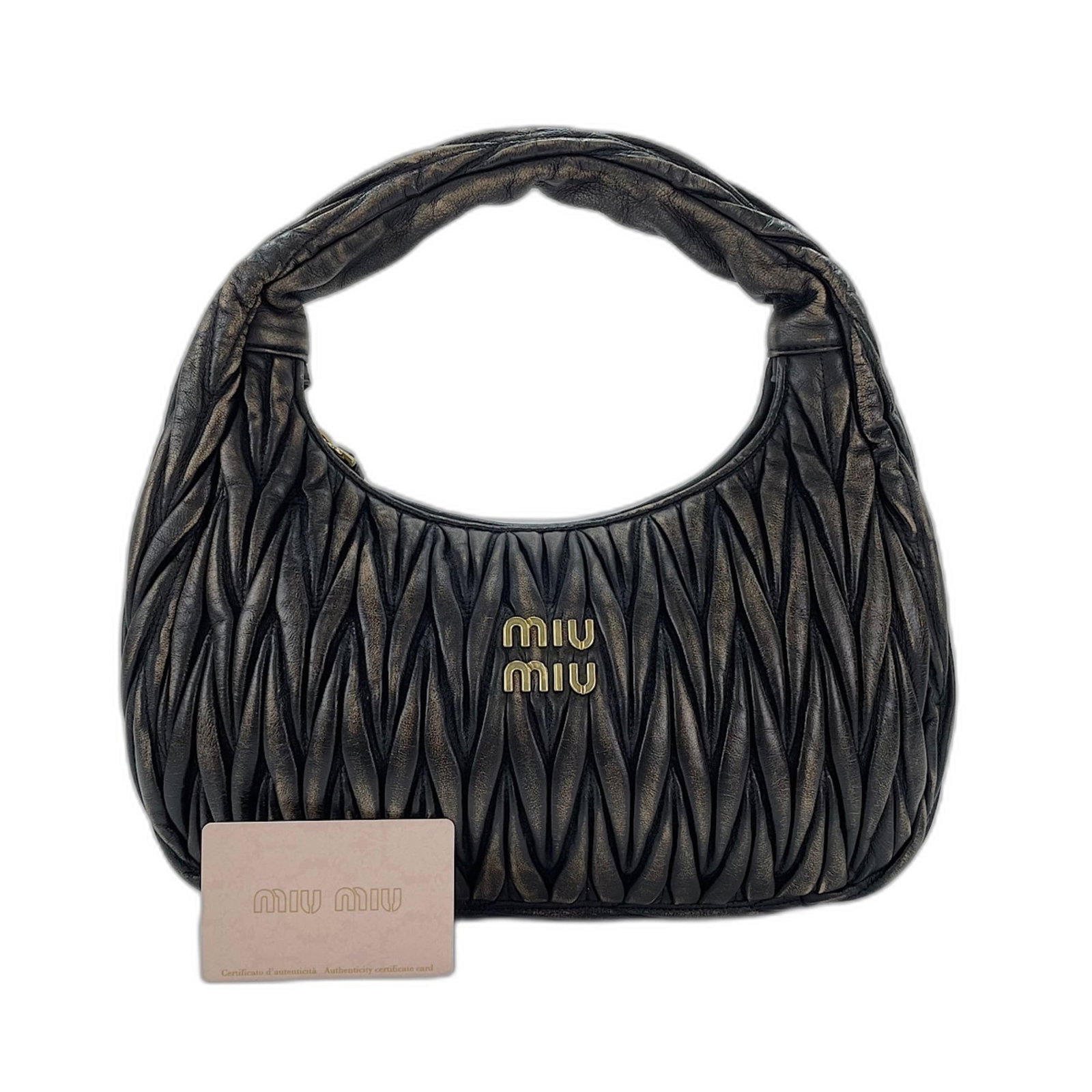 Handbag Leather Miu: Handbag Leather Miu Brown leather Miu Miu handbag with dimensions 17cm x 30cm x 9cm. The bag features high-quality materials and a classic design, making it a stylish accessory for everyday use. Its