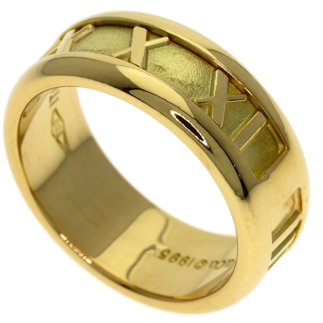 Atlas K18 Tiffany Co. Yellow Gold Ring: Atlas K18 Tiffany Co. Yellow Gold Ring K18 Yellow Gold Ring from Tiffany & Co. boasts its purity and luxurious metal, making it a standout piece. This ring features no main stone, allowing the gold