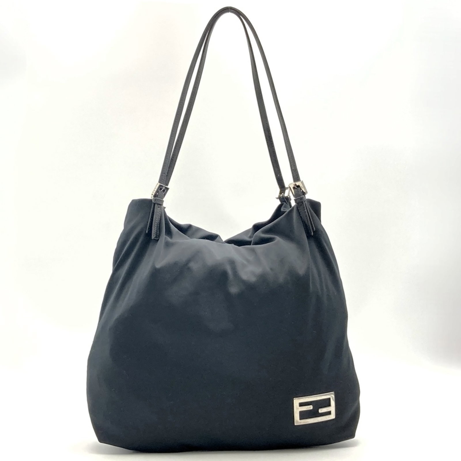Cotton Leather Fendi Bag: Cotton Leather Fendi Bag Cotton leather Fendi bag in black, measuring 33cm x 36cm x 9cm. This tote features a unique blend of materials and a classic design. The bag's cotton and leather construction