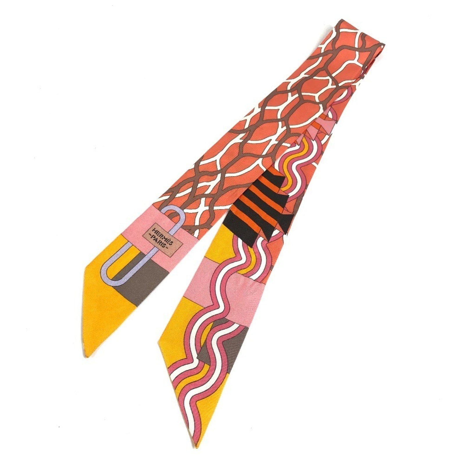Hermes Silk Scarf: Hermes Silk Scarf Silk from France, a vibrant multi-color design featuring orange and pink hues, adorns this elegant 5cm x 85cm scarf. Made from high-quality silk, its unique size offers a statement
