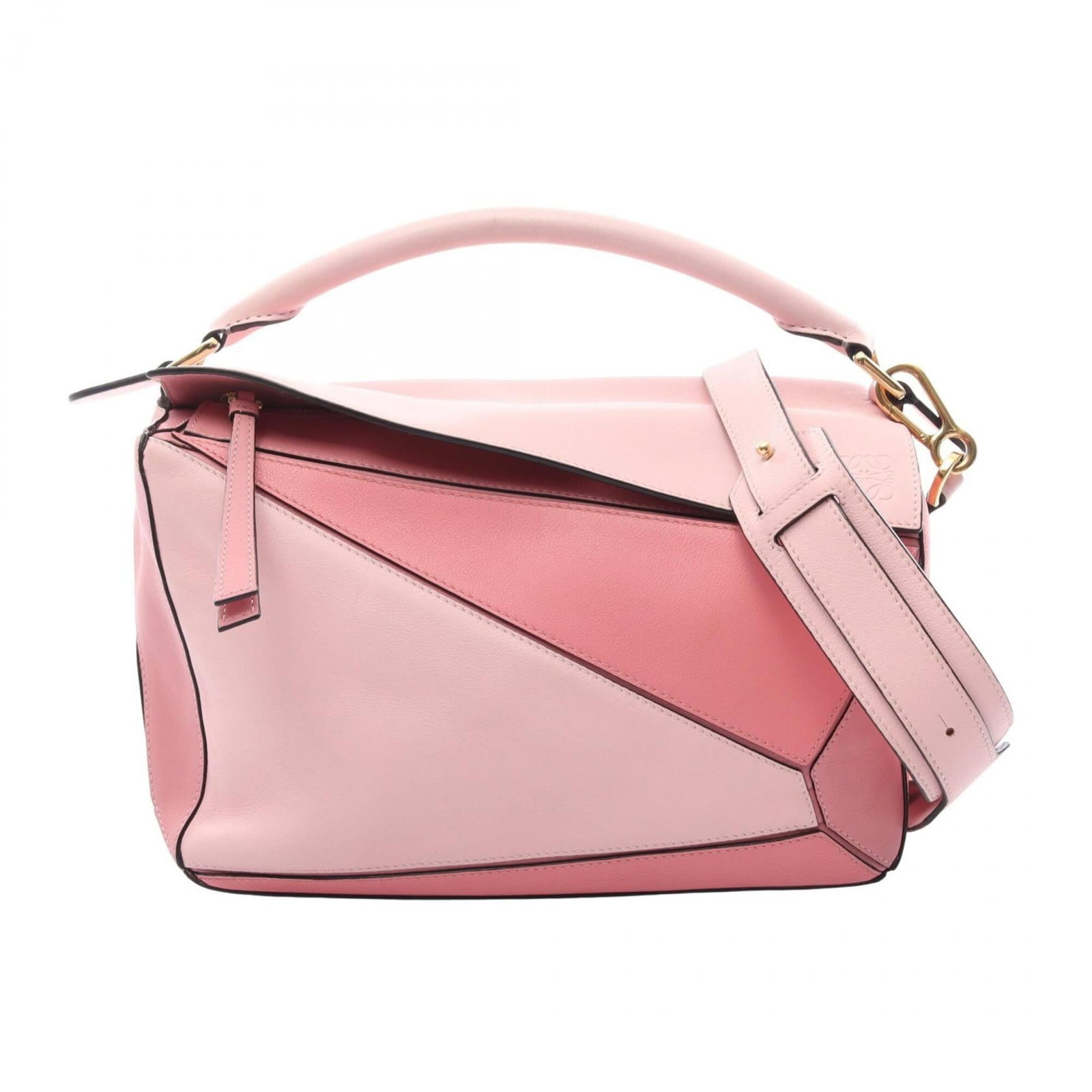 Loewe Handbag Leather: Loewe Handbag Leather Pink Loewe Handbag Leather. Made from high-quality leather, this handbag measures 18cm x 29cm x 12cm and features a distinctive pink color. The bag's size and material make it a