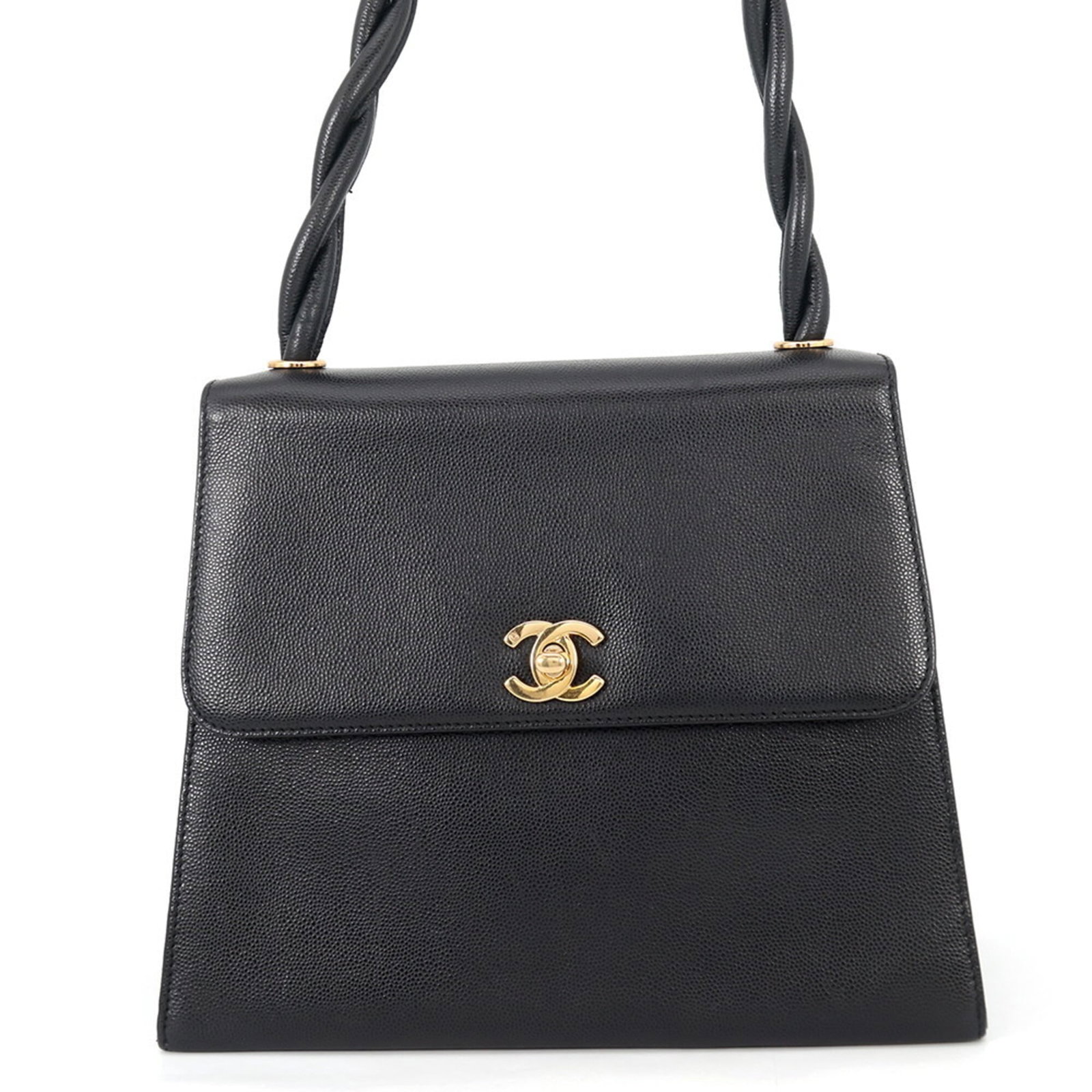 Calfskin handbag bag shoulder Chanel: Calfskin handbag bag shoulder Chanel Calfskin handbag bag shoulder Chanel features a classic design made from high-quality grained Calfskin material, with a sleek black finish. The bag measures 20cm