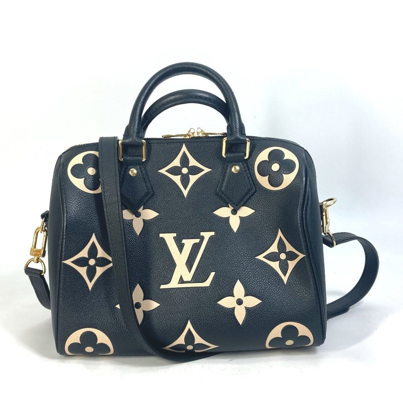 Boston Handbag Bag Monogram Empreinte Louis Vuitton Shoulder: Boston Handbag Bag Monogram Empreinte Louis Vuitton Shoulder The Louis Vuitton Boston Handbag features the iconic Monogram Empreinte design in black, with a zipper closure and open pocket. Measuring
