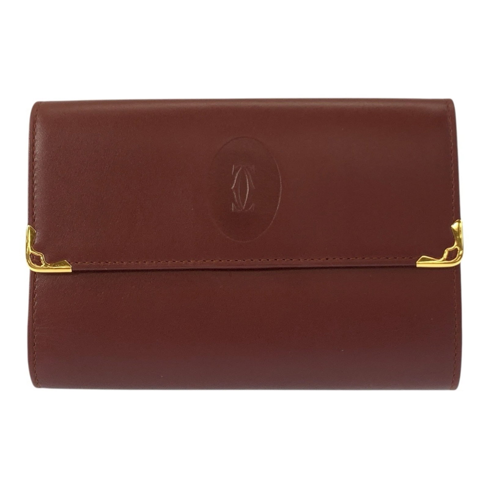 Cartier Coin Purse/ Coin Case Leather: Cartier Coin Purse/ Coin Case Leather Cartier's iconic Coin Purse/ Coin Case Leather is a timeless accessory, boasting sleek Bordeaux leather and precise dimensions. This compact, 10cm x 14cm x 2cm