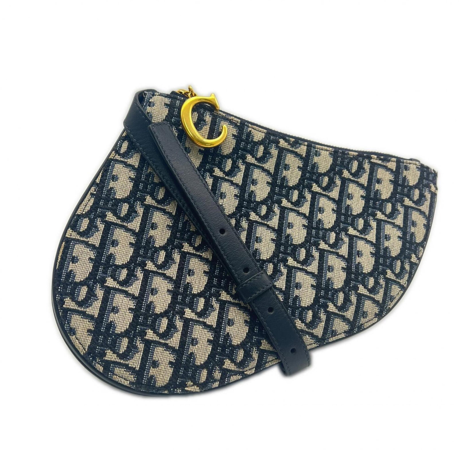 Christian Dior Pouch Leather Shoulder Bag: Christian Dior Pouch Leather Shoulder Bag This elegant Christian Dior Pouch Leather Shoulder Bag features a timeless design with a beige and navy color combination. Made from high-quality leather and