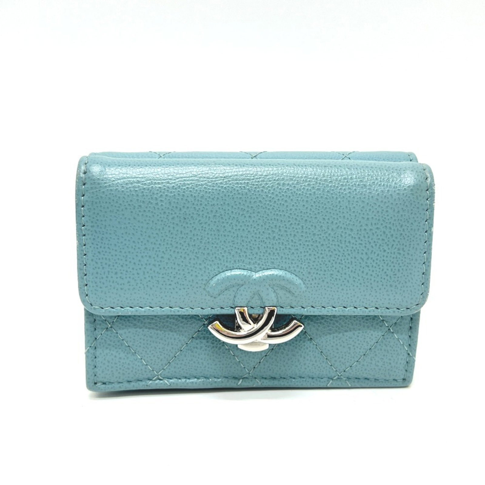 Chanel Wallet (Tri-Fold) Leather: Chanel Wallet (Tri-Fold) Leather The Chanel Wallet (Tri-Fold) Leather features a classic tri-fold design with light blue leather, measuring 7cm x 10.5cm x 3.5cm. Includes a dust bag for added protecti