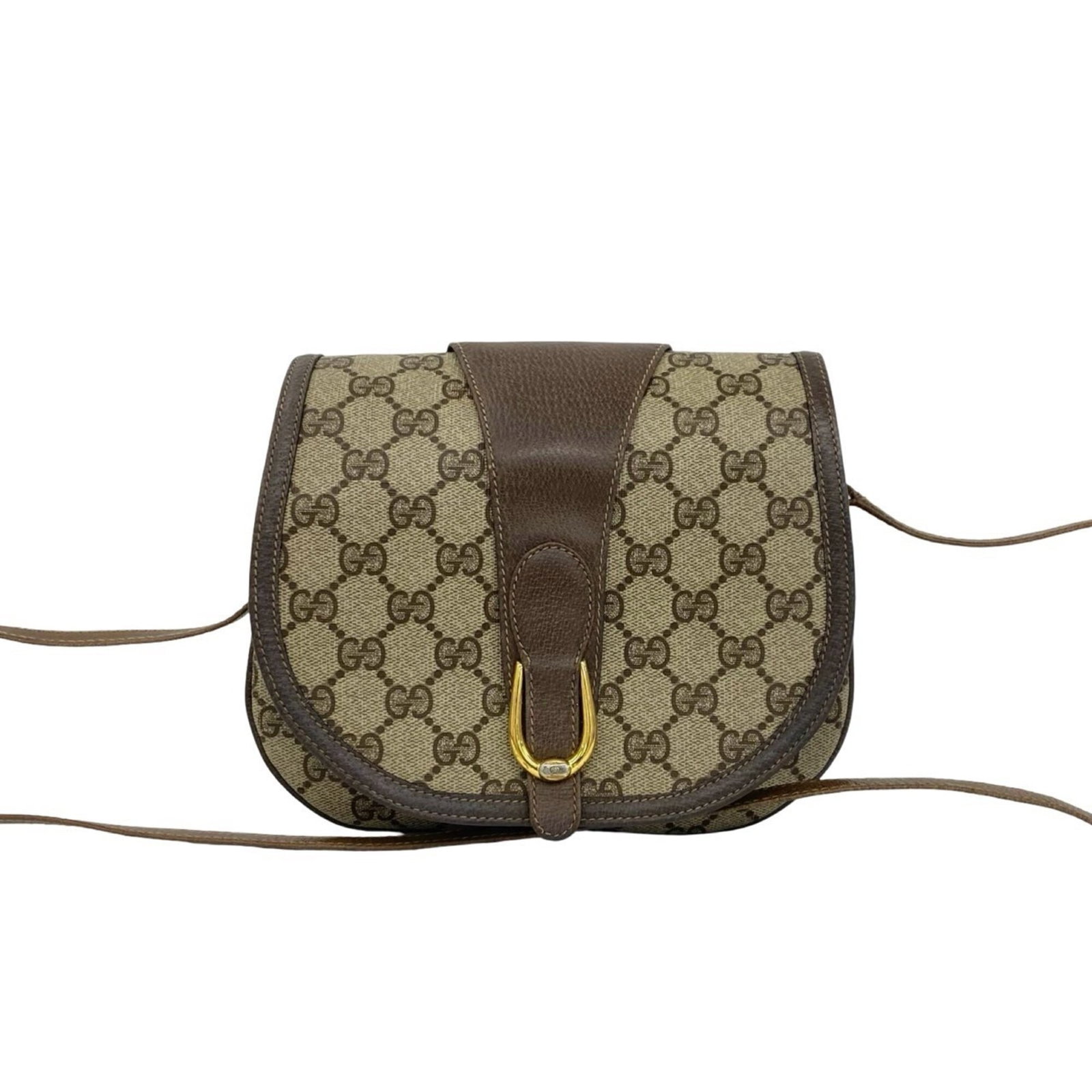 PVC leather bag shoulder pochette Gucci: PVC leather bag shoulder pochette Gucci This Gucci pochette shoulder bag features high-quality leather and PVC material, with a classic brown color. Measuring 18cm x 21.5cm x 4cm, it has a stylish des