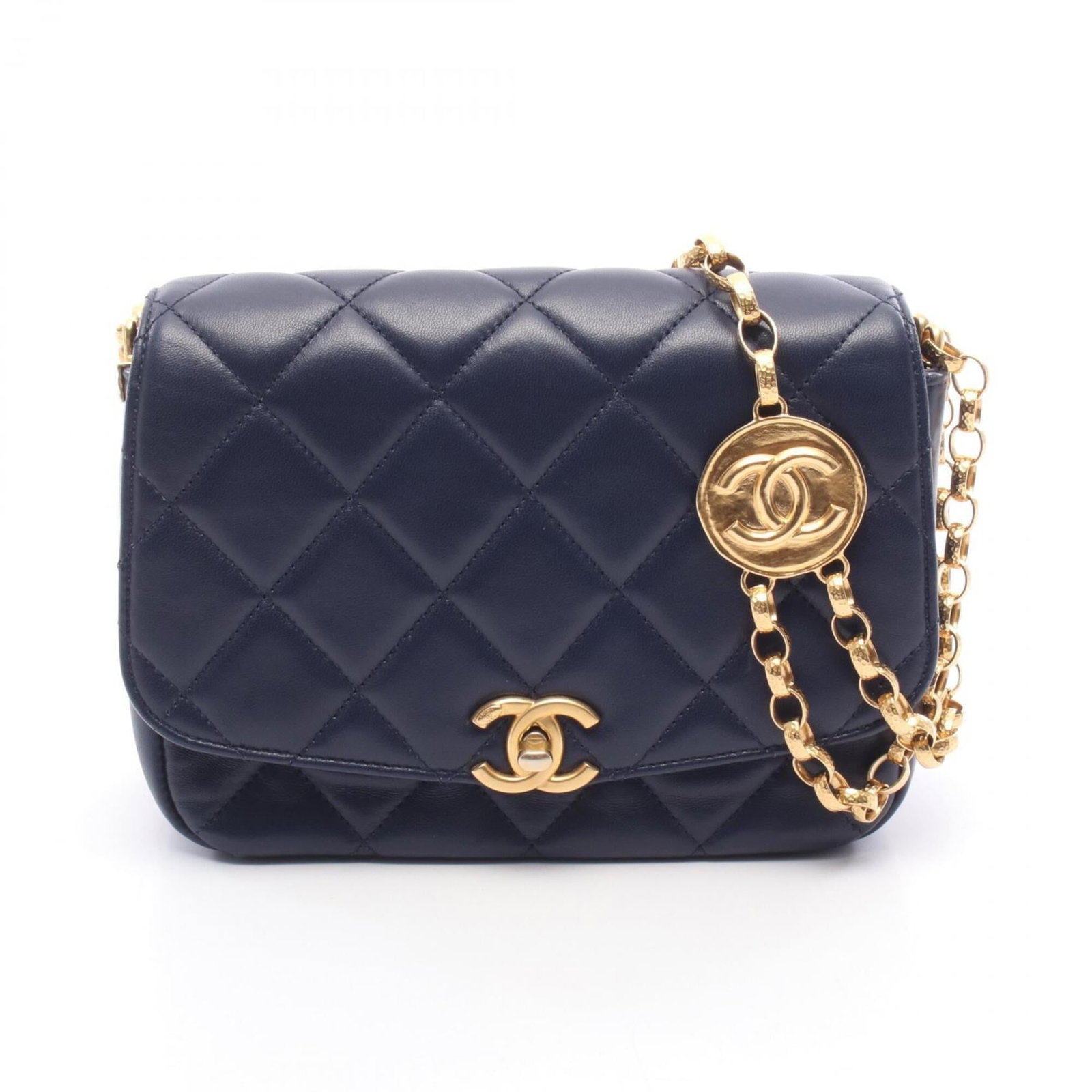 Chanel Handbag Shoulder Bag Leather: Chanel Handbag Shoulder Bag Leather Navy lambskin leather Chanel shoulder bag with gold hardware, measuring 16cm x 20cm x 6.5cm. This classic design showcases the timeless elegance of Chanel's signatu