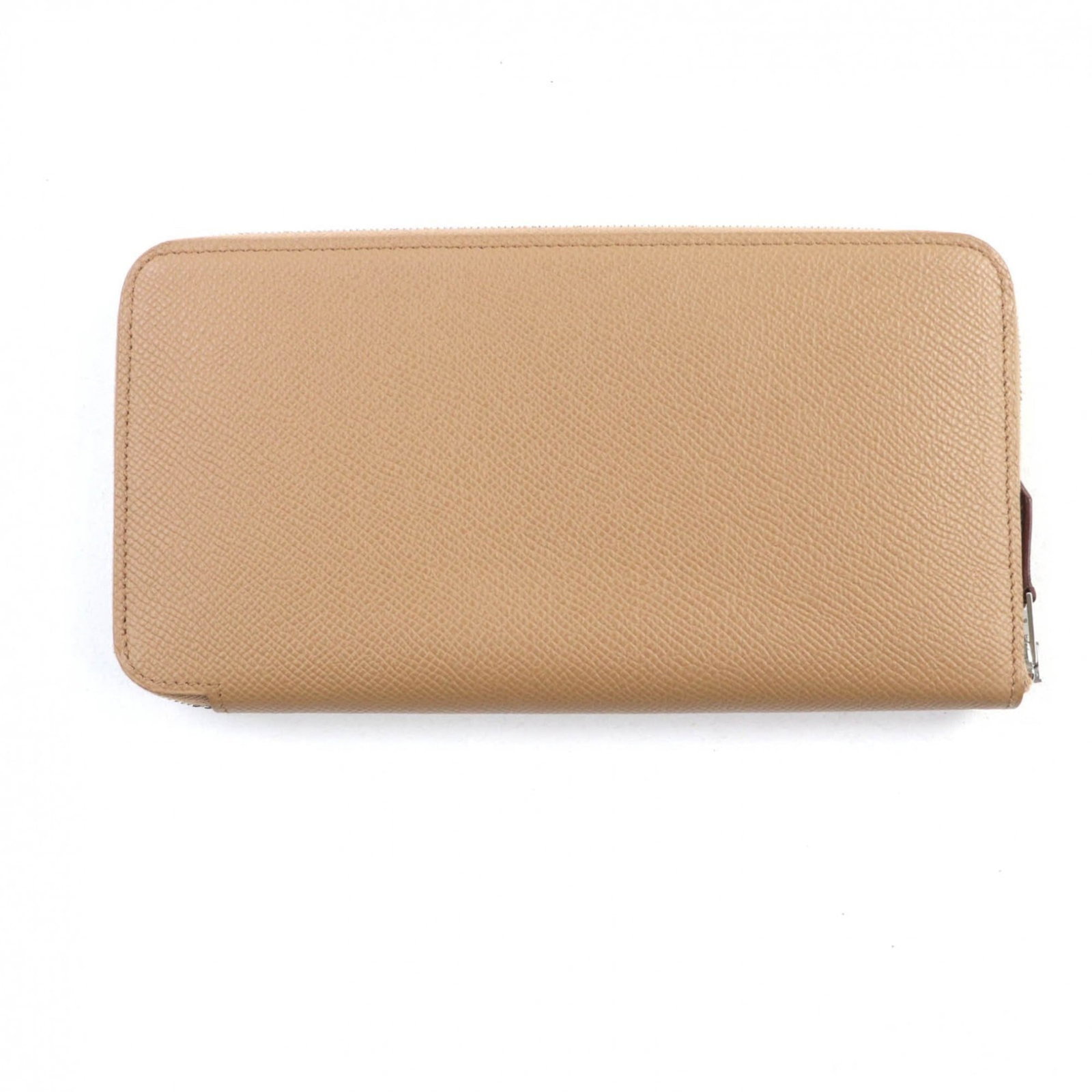 Epsom Leather Bi Fold Wallet Hermes: Epsom Leather Bi Fold Wallet Hermes Epsom leather bi-fold wallet from the iconic Hermes Silk'in line, crafted in France with attention to detail. This elegant design features a zipper closure and mult