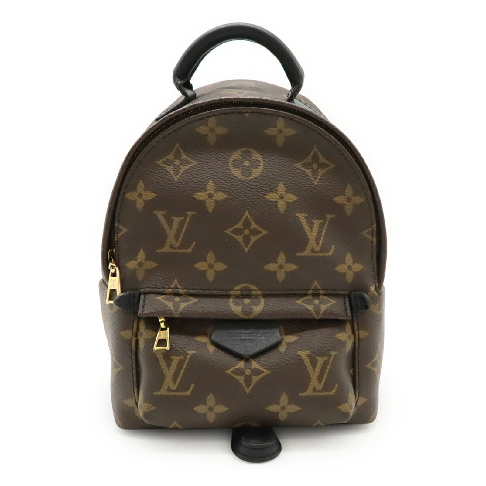 Leather Monogram Louis Vuitton Backpack: Leather Monogram Louis Vuitton Backpack Monogrammed in rich brown leather, this Louis Vuitton backpack boasts the iconic Monogram pattern. With its sleek design and compact size, it's perfect for dail