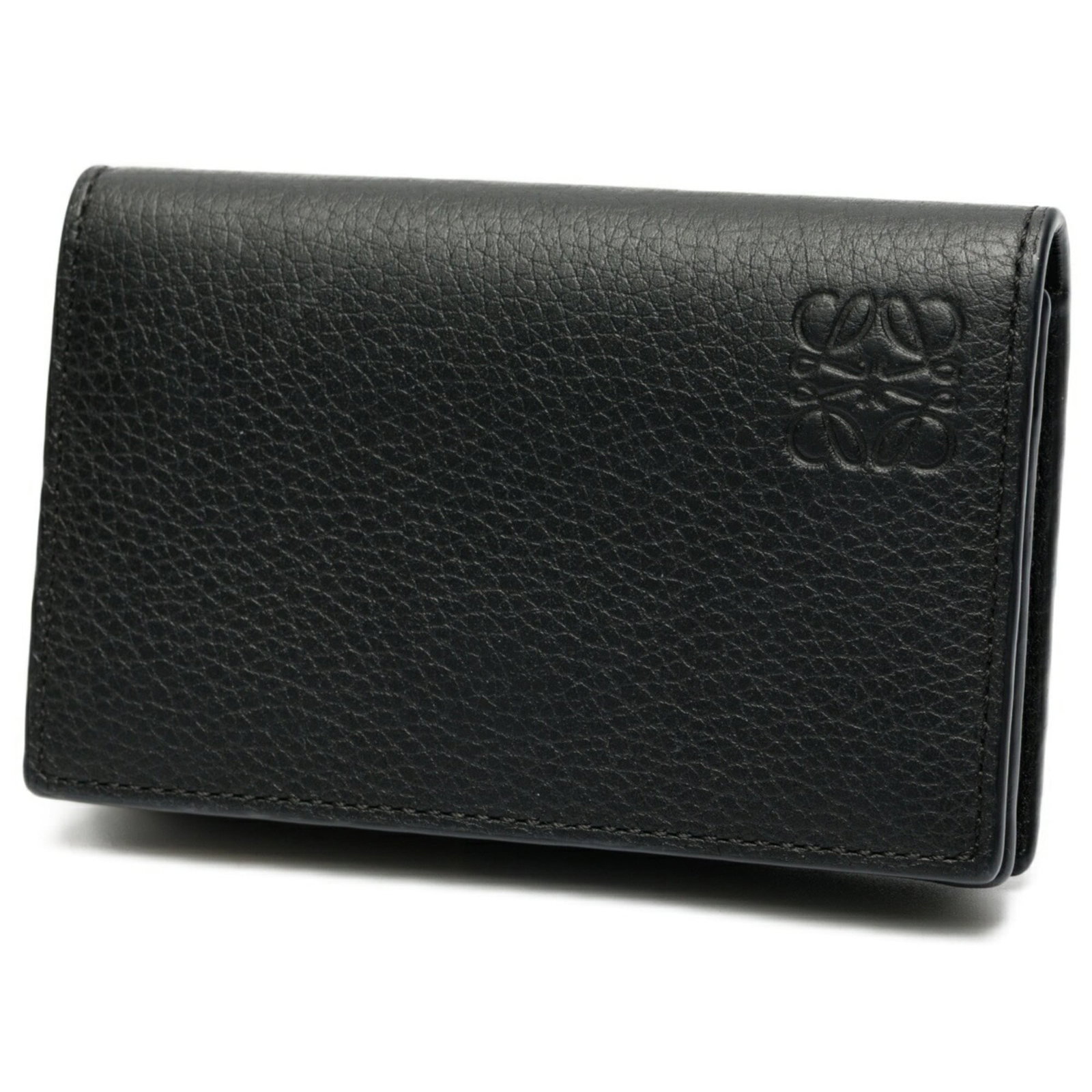 Card case leather from Loewe: Card case leather from Loewe Card case leather from Loewe bears a signature. Made from high-quality black leather, it measures 7cm x 10.8cm x 2cm and features a sleek design. This card case is crafted