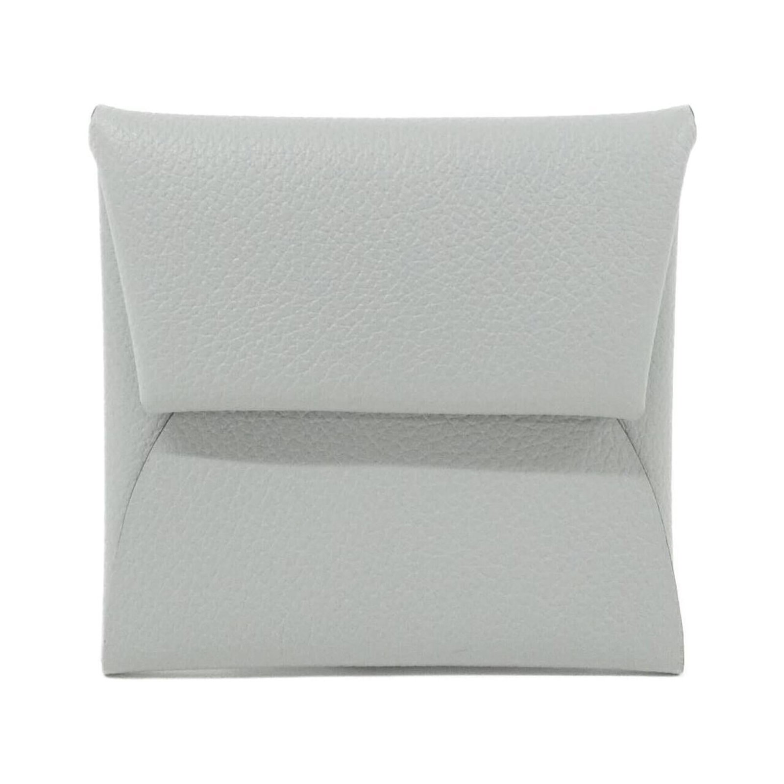 Coin purse by Hermes: Coin purse by Hermes The Hermes coin purse boasts a vibrant blue hue, measuring 8.5cm x 8cm in size. With its compact dimensions and sleek design, it makes for a stylish accessory that can be easily