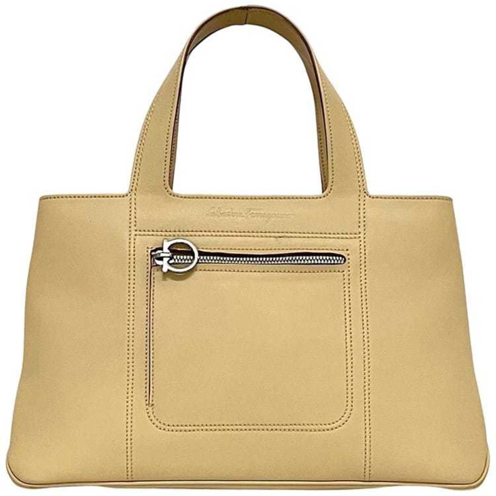 Ferragamo Salvatore Handbag Leather Tote: Ferragamo Salvatore Handbag Leather Tote The Salvatore Ferragamo Leather Tote is a classic, elegant design featuring high-quality beige leather. With its spacious interior and durable construction,