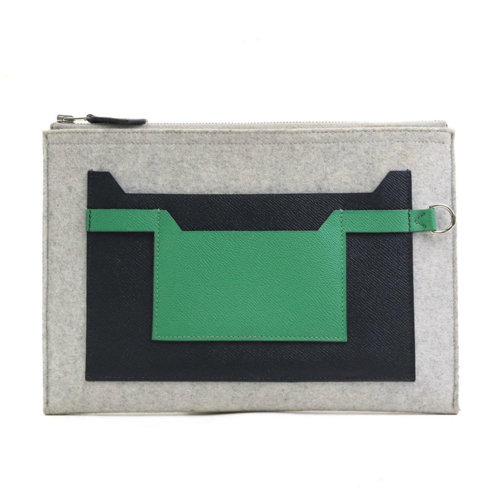 Felt Leather Clutch Bag by Hermes: Felt Leather Clutch Bag by Hermes The Felt Leather Clutch Bag by Hermes boasts a unique combination of felt and leather materials, creating a distinctive look. Available in three colors - black,