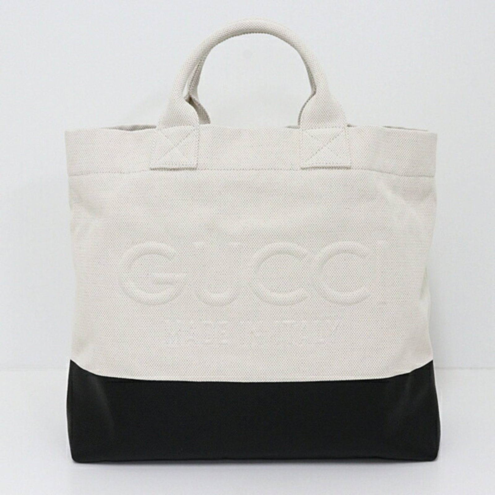 Gucci Tote Bag Canvas: Gucci Tote Bag Canvas Canvas tote bag from Gucci, available in black and ivory. This classic design features a canvas material with dimensions of 36cm x 39.5cm x 16.5cm. The bag is a timeless