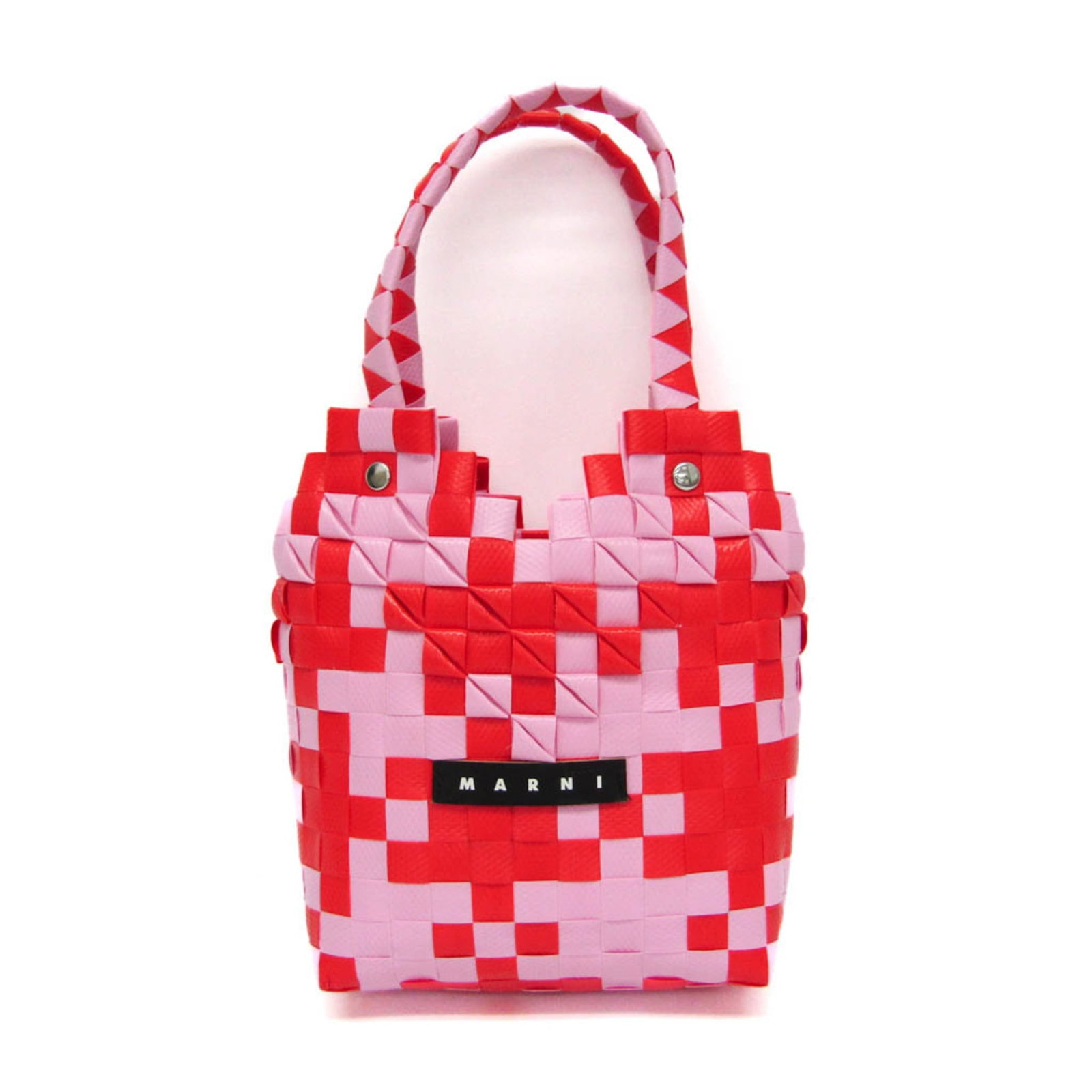 Marni Handbag Polypropylene Leather: Marni Handbag Polypropylene Leather Polypropylene leather gives this Marni Kids Line Diamond Basket Bag its unique texture and look, while the pink and red color options add a playful touch. The open